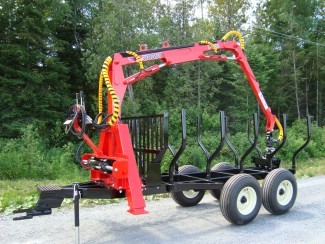 Log loader on trailer Woody 130HD