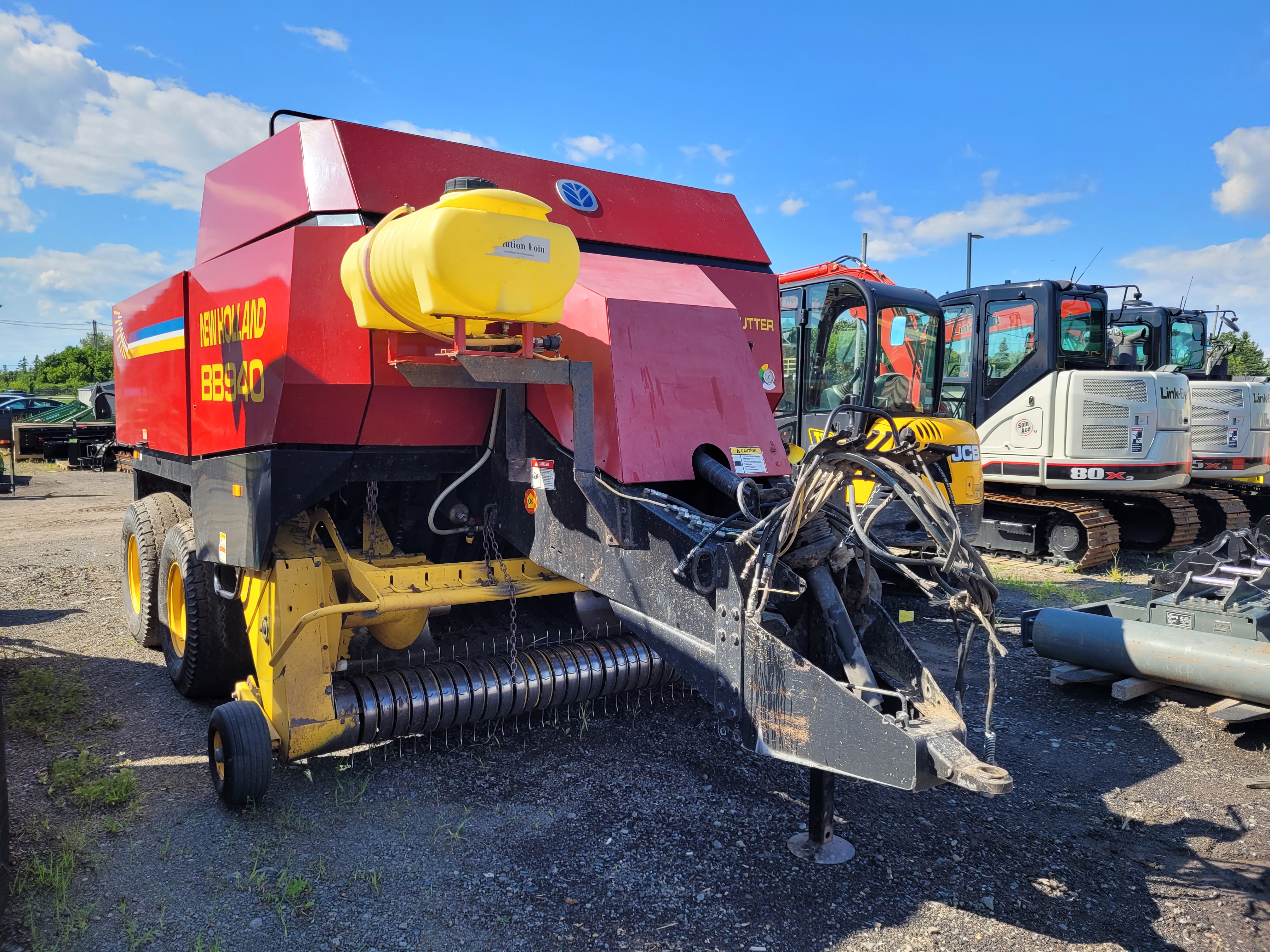 Presse à balles carrées New Holland BB940