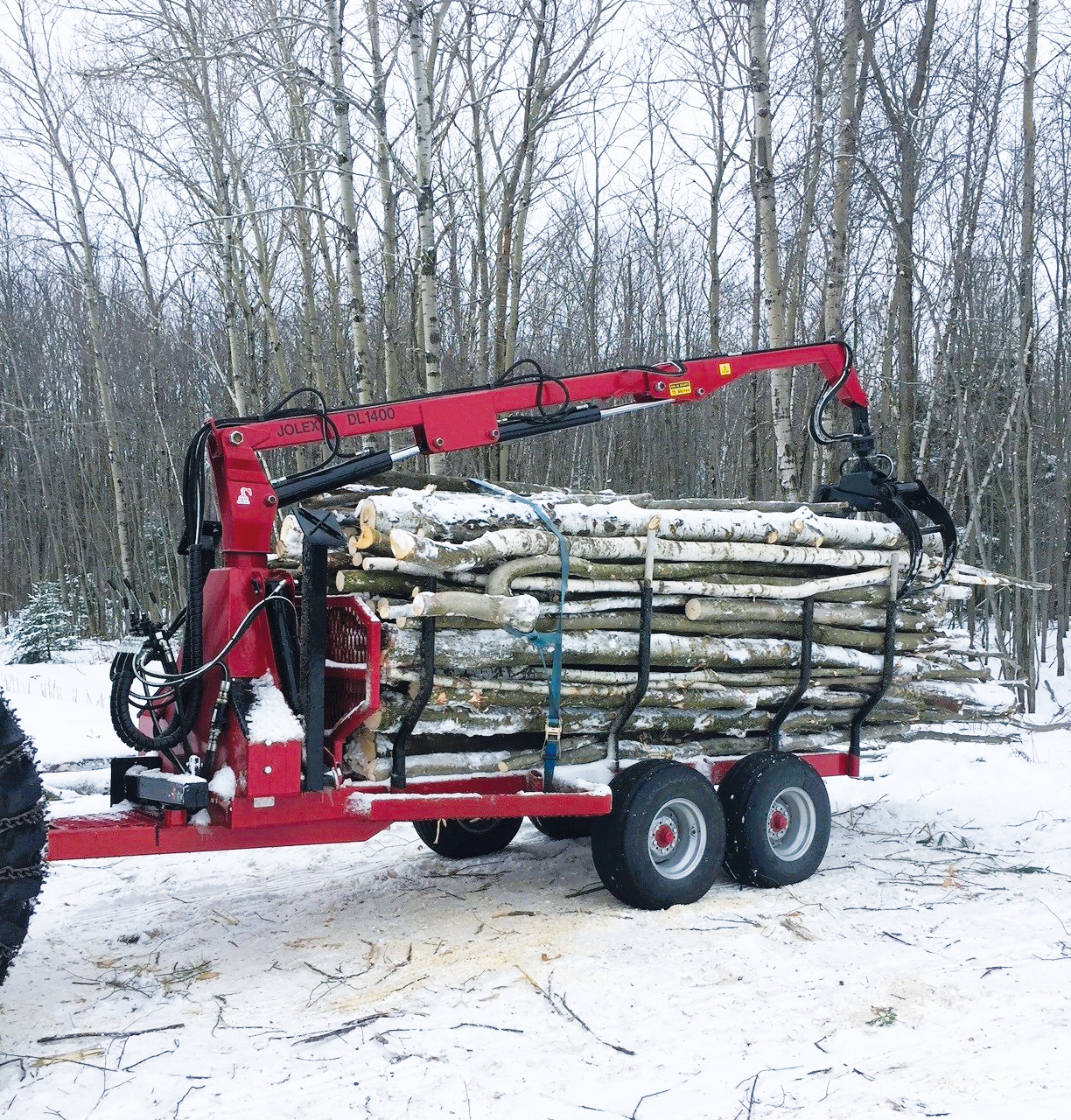 Log loader on trailer 1400 DL
