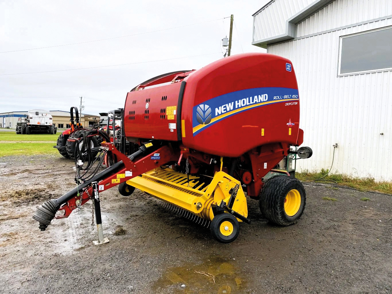 Presse à balles rondes New Holland 450