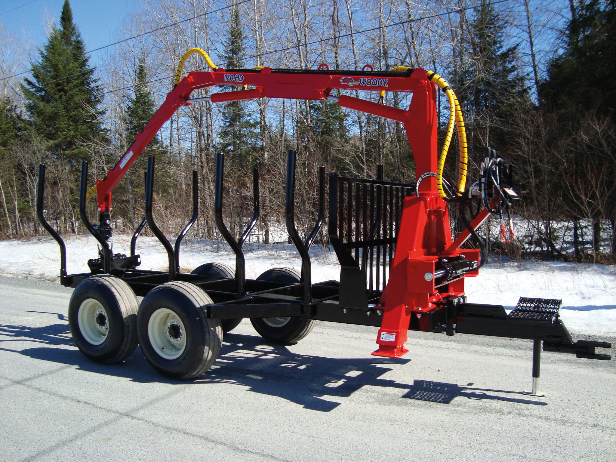 Log loader on trailer Woody 150 HD-T