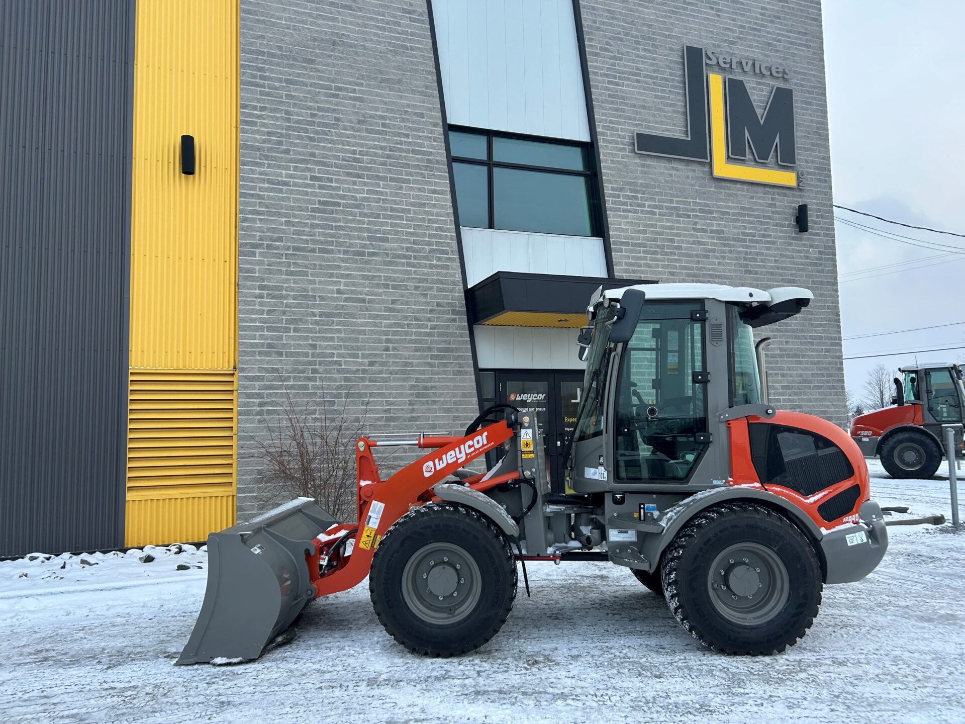 Chargeur articulé sur pneus  WEYCOR AR440