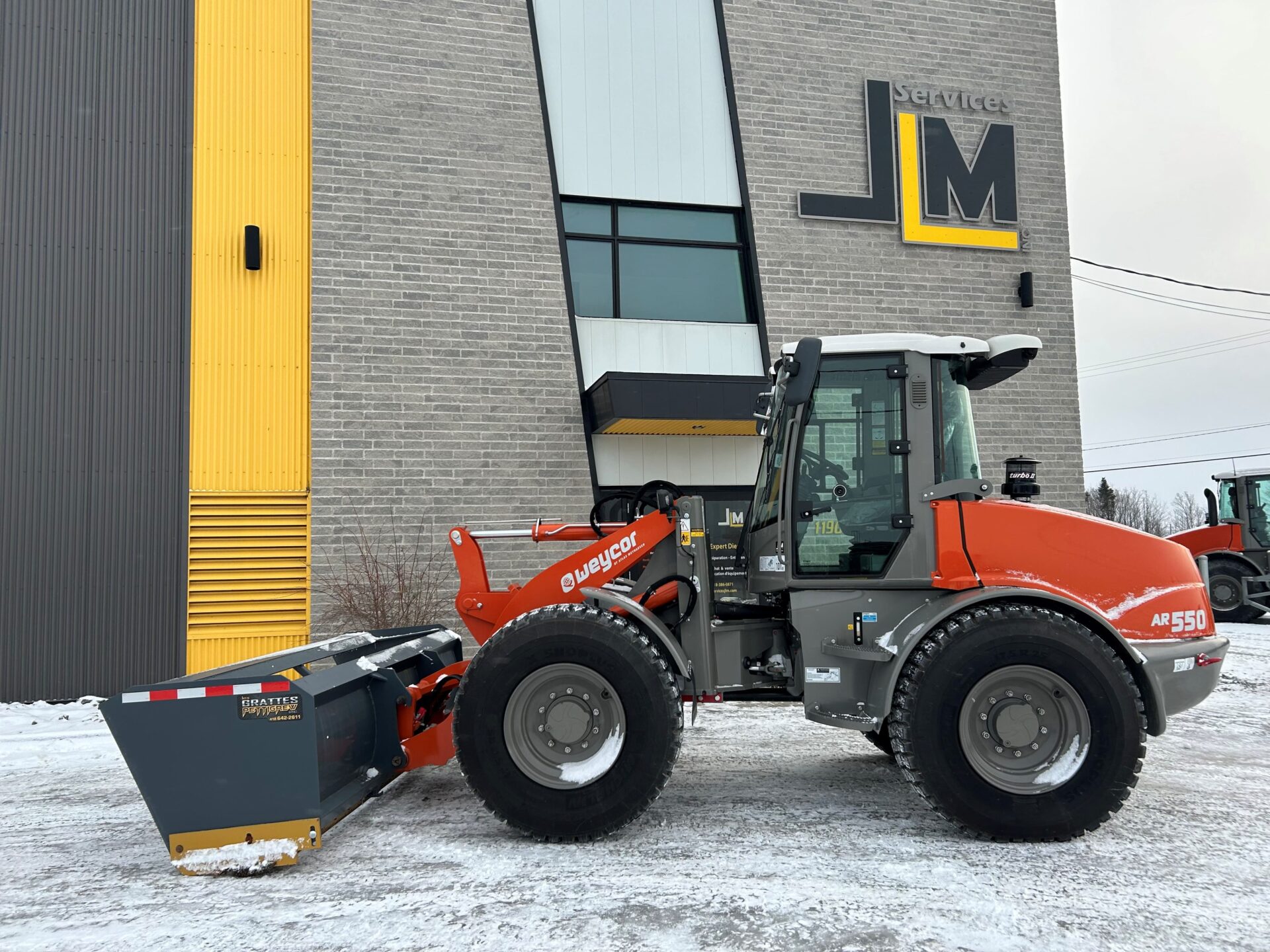 Chargeur articulé sur pneus  WEYCOR AR550