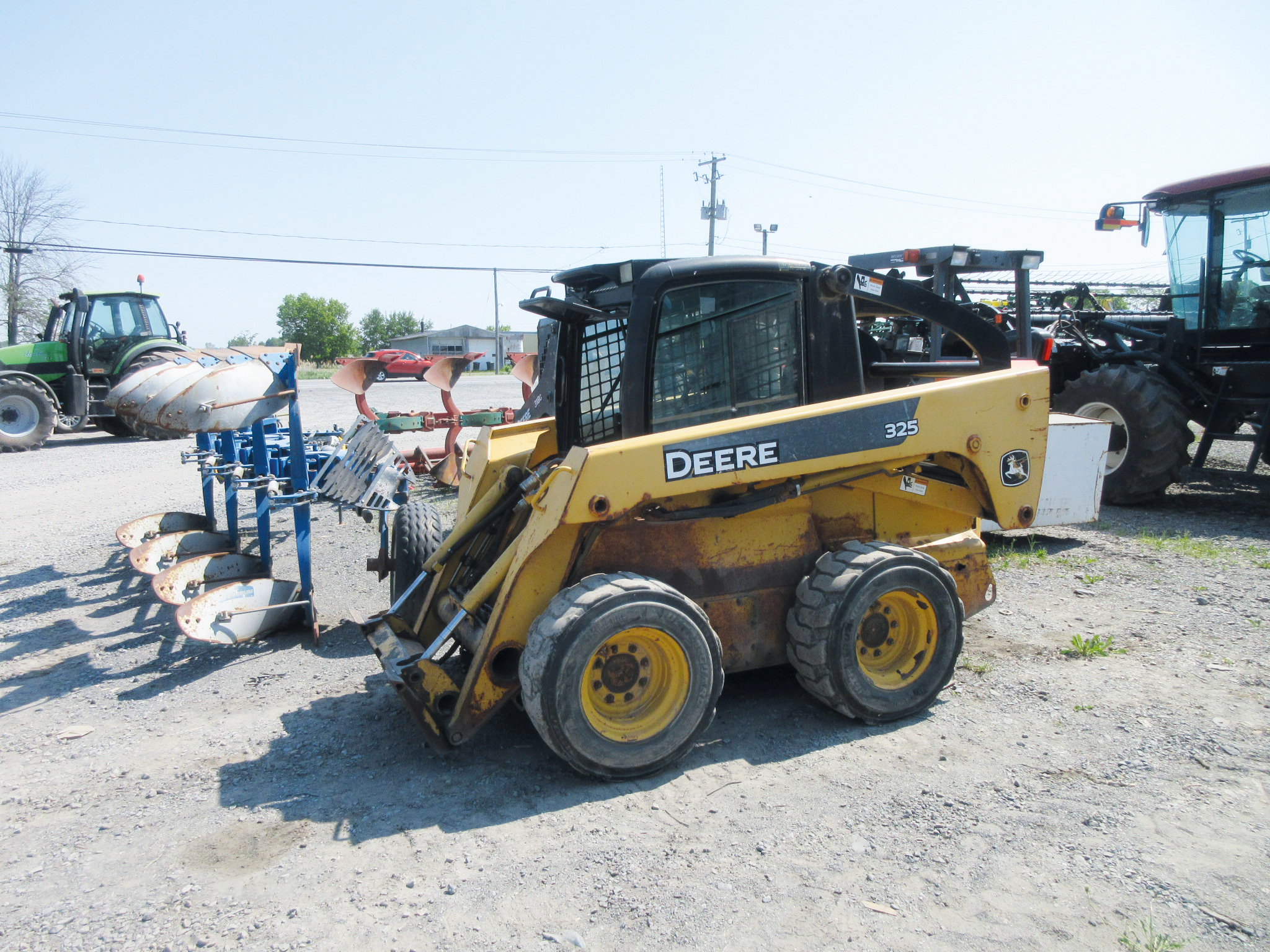 Skid steer loader (skid steer / skid loader) John Deere 325