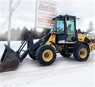 Chargeur articulé sur pneus New Holland W80B