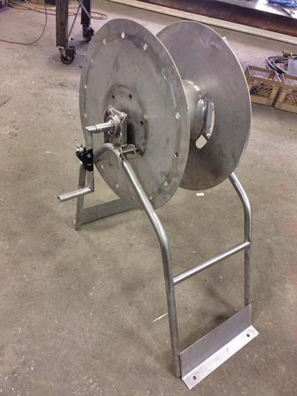 Porteur pour boyaux   Dévidoir à boyau